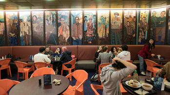 students eating inside portfolio cafe