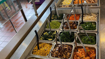 photo of a prep station for ramen bowls