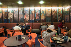 students eating inside portfolio cafe