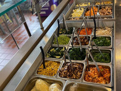 photo of a prep station for ramen bowls
